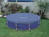An Intex pool covered with a blue tarp sits on a green lawn surrounded by plants and a wall. Produktbild-Vorschau