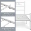 Close-up views of a white metal bed frame assembly, with German instructions. Produktbild-Vorschau