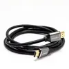 A coiled black HDMI cable with gold-plated connectors against a white background. Podgląd zdjęcia produktu