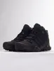 A pair of black Adidas Terrex hiking boots are shown against a white background. Anteprima dell’immagine prodotto