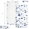 A flat lay of a crib sheet with a retro car pattern and a close-up of the sheet's dimensions. Produktbild-Vorschau