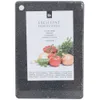 A black speckled cutting board with a label showing vegetables and product information. Anteprima dell’immagine prodotto
