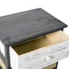 A close-up view of an open drawer on a wooden dresser. Anteprima dell’immagine prodotto