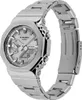 A silver G-Shock watch with a metal band is shown against a white background. Voir les images du produit