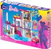 The image shows the packaging of a Barbie Dreamhouse toy set, featuring the toy itself and promotional graphics. Podgląd zdjęcia produktu
