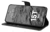 A black flip case for a smartphone is shown open, displaying the phone's screen. Produktbild-Vorschau