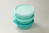A stack of three Tupperware containers in varying shades of turquoise. Anteprima dell’immagine prodotto