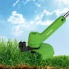 A green electric grass trimmer is shown in a grassy yard with a blue sky and clouds in the background. Produktbild-Vorschau