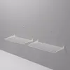 Two white folding wall-mounted drying racks are shown on a light gray wall. Produktbild-Vorschau