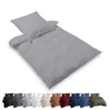 A bedding set is displayed on a white background, with a smaller selection of the same bedding set in various colors shown below. Produktbild-Vorschau