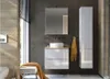A modern bathroom with a wall-mounted vanity, sink, mirror cabinet, and tall storage cabinet. Anteprima dell’immagine prodotto