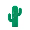 A green cactus-shaped tea infuser is shown against a white background. Voir les images du produit