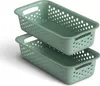 Two green storage baskets stacked on top of each other against a white background. Anteprima dell’immagine prodotto
