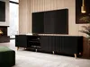A modern living room with a fireplace, a large TV on a black media console, and a green ottoman. Náhľad obrázku produktu