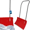 Two views of a red snow shovel against a white background, with one shovel partially in snow. Náhled obrázku produktu