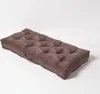 A brown tufted sofa cushion or bench pad is shown on a white background. Náhled obrázku produktu