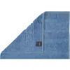 A blue towel folded diagonally. Anteprima dell’immagine prodotto