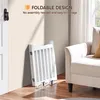 A white foldable dog gate is leaning against a wall next to a sofa. Podgląd zdjęcia produktu