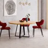 A dining table with chairs in a modern room setting. Produktbild-Vorschau