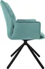A side view of a teal velvet armchair with a black base. Náhled obrázku produktu