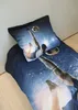 A close-up view of a soccer-themed duvet cover and pillowcase set on a bed. Náhľad obrázku produktu