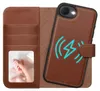 A brown leather wallet-style phone case is open, showing the inside with card slots and a photo window. The phone is attached to the right side of the case. Produktbild-Vorschau