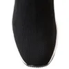 A close-up view of the toe of a black sock sneaker. Anteprima dell’immagine prodotto