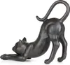 A dark gray, stylized cat sculpture is shown in a stretching pose against a white background. Anteprima dell’immagine prodotto