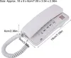 A white landline telephone with dimensions indicated by text overlays. Podgląd zdjęcia produktu