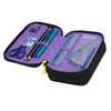 An open pencil case with various stationery items inside. Podgląd zdjęcia produktu