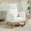 A white rocking chair with wooden legs is placed in a living room setting. Anteprima dell’immagine prodotto