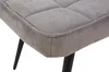 A close-up view of a gray upholstered stool with black metal legs. Náhled obrázku produktu