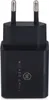 A black dual USB wall charger with two metal prongs for plugging into an electrical outlet. Produktbild-Vorschau
