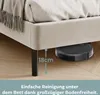 A robot vacuum cleaner is shown cleaning under a bed frame, highlighting the bed's clearance. Produktbild-Vorschau