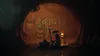 A cat and a figure in a hat on a raft in a dark tunnel with graffiti. Produktbild-Vorschau