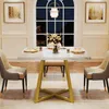 A dining table set in a well-lit room with a large arched window in the background. Produktbild-Vorschau