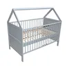 A baby crib with a house-shaped frame, shown from a slightly elevated side angle against a white background. Produktbild-Vorschau