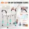 A person is using a shower chair in a bathroom. Podgląd zdjęcia produktu