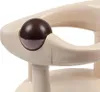 A close-up shot of a beige baby bath seat with a brown ball detail. Produktbild-Vorschau
