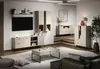 A modern living room with a TV unit, coffee table, and other furniture. Voir les images du produit