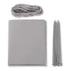 A flat lay of a grey balcony privacy screen, a bundle of grey rope, and a bundle of grey zip ties, all on a white background. Produktbild-Vorschau