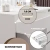 A close-up view of a white dresser or vanity with drawers, highlighting specific features. Náhled obrázku produktu