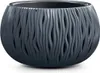 A dark gray, round planter with a wavy, cut-out pattern. Náhľad obrázku produktu