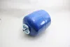 A blue pressure expansion vessel is shown lying on a white surface. Produktbild-Vorschau