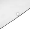 A close-up view of a white tarp with a grommet. Podgląd zdjęcia produktu