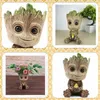 A collage of four images showing a Baby Groot planter/ornament from different angles and with different contents. Produktbild-Vorschau