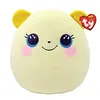 A plush toy with a round yellow body, large blue eyes with glitter, pink cheeks, and small yellow ears. It has a simple smiling mouth and a small black nose. Produktbild-Vorschau