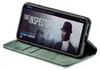 A smartphone in a green flip case is displayed, showing a movie poster on its screen. Produktbild-Vorschau