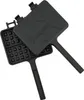 A black cast iron waffle maker with handles, shown open. Produktbild-Vorschau