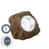 A solar-powered rock-shaped garden light with icons indicating its functions. Anteprima dell’immagine prodotto